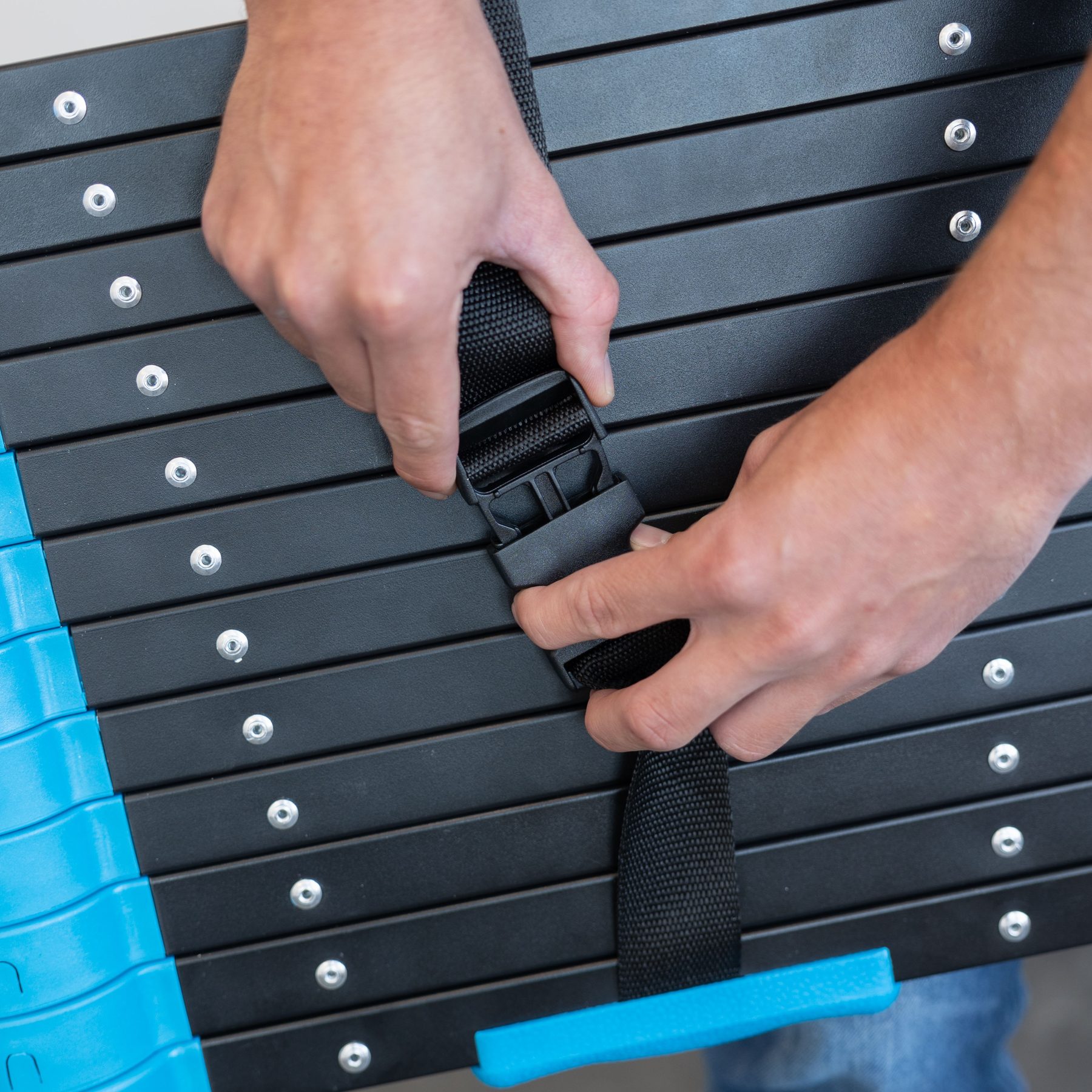 Telescopic ladder with carry strap