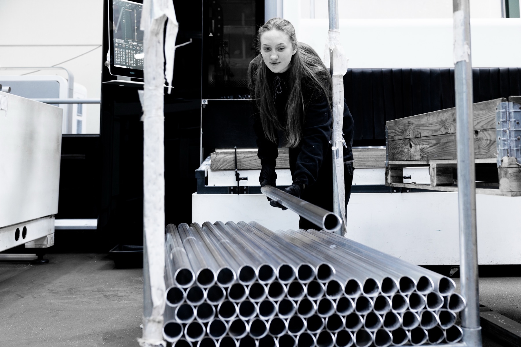 Aluminium tubes on a cart